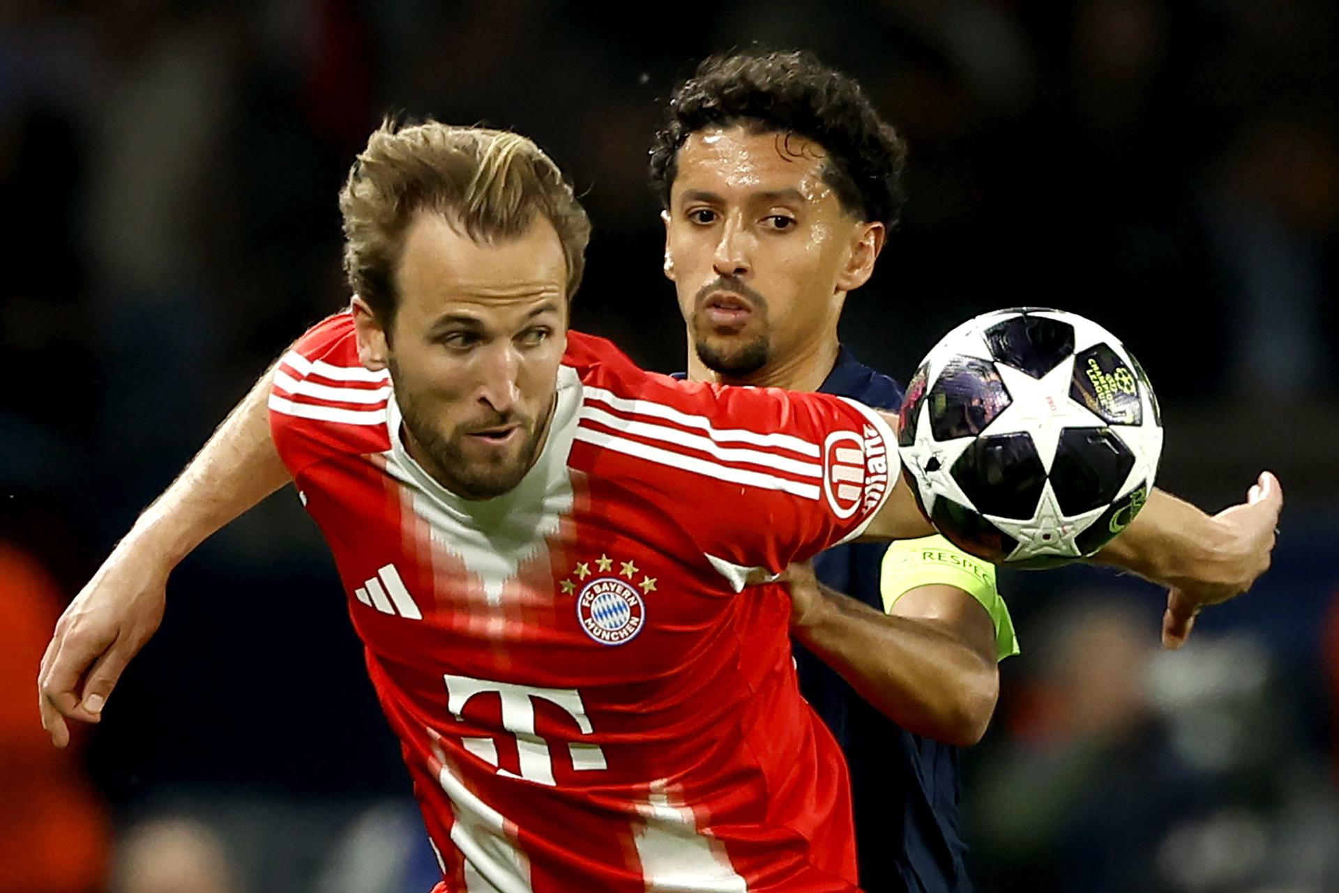 Marquinhos, del PSG, y Harry Kane, del Bayern, durante el partido de ida de semifinales de la Liga de Campeones. EFE/EPA/YOAN VALAT